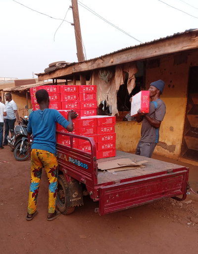 Hustlers Loading Tin Tomatoes in Tricycle 02, Tamale, 2022