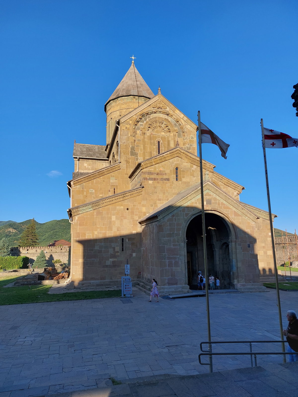 Flags in front of the Svetitskhoveli Cathedral in Mtskheta, Georgia, Mtskheta, Georgia, 2023