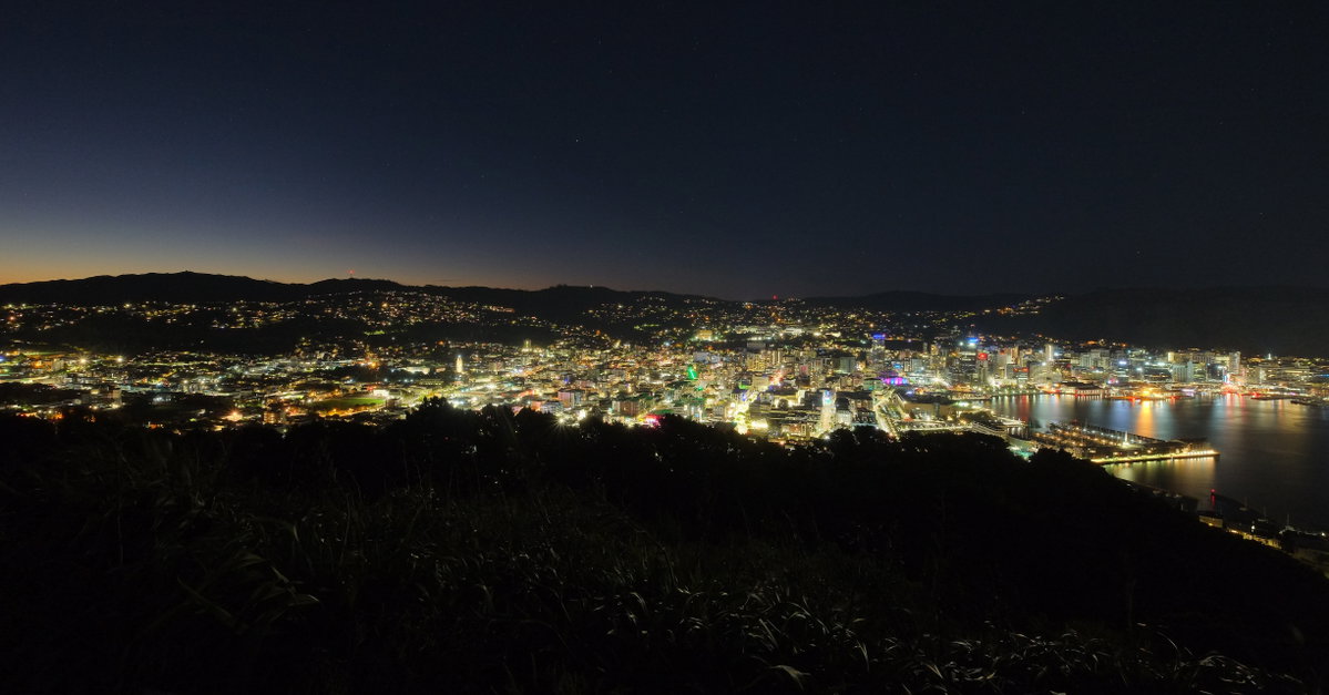 Ultra-wide view over Wellington City from Mount Victoria at night, Wellington, New Zealand, 2024
