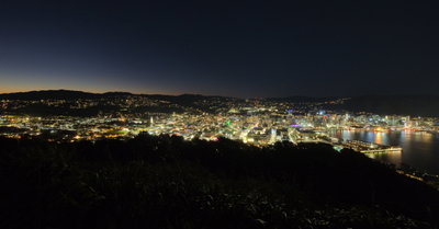 Ultra-wide view over Wellington City from Mount Victoria at night, Wellington, 2024