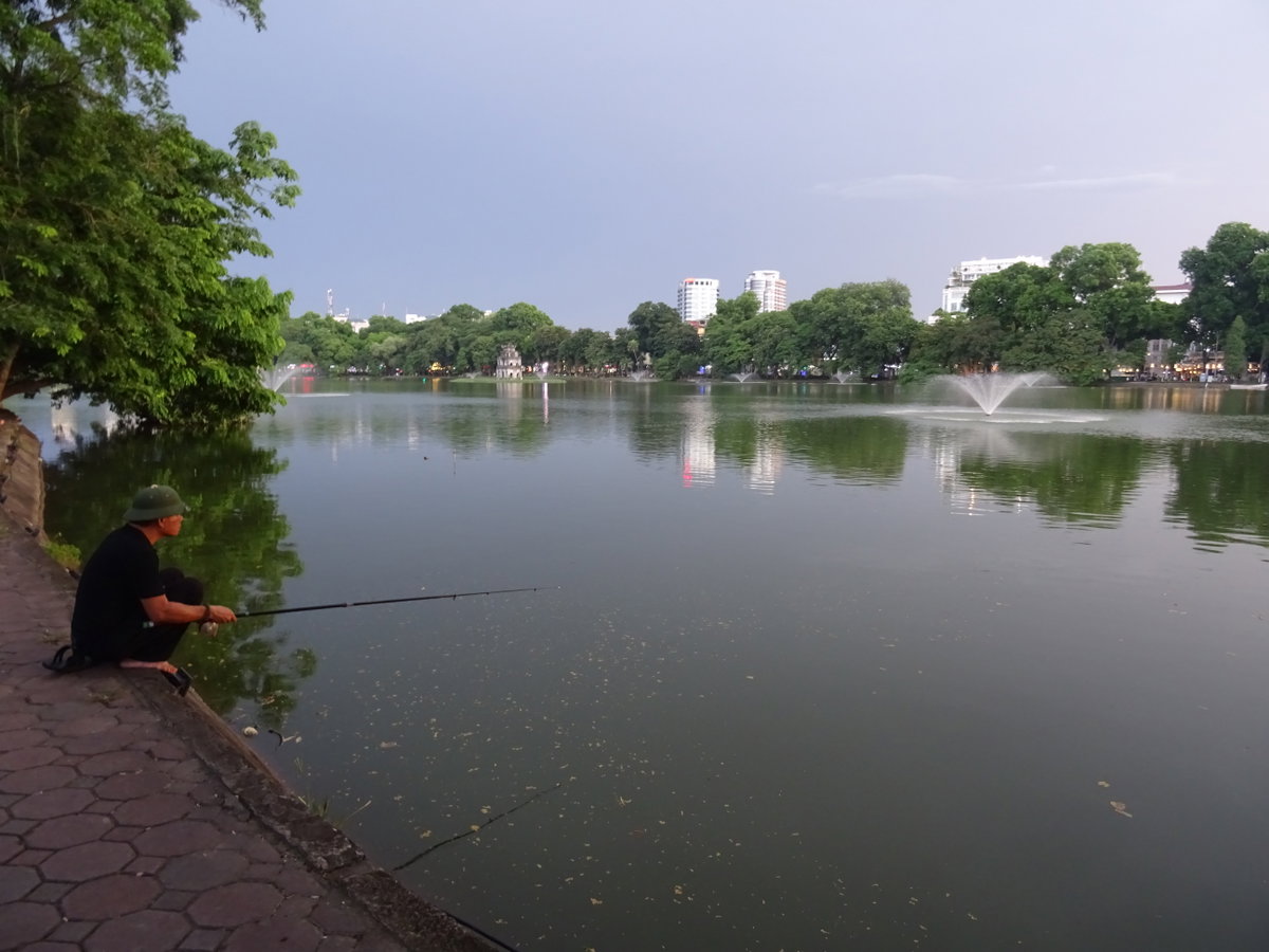 Angler at Hoan Kiem Lake, Hanoi, Vietnam, 2018