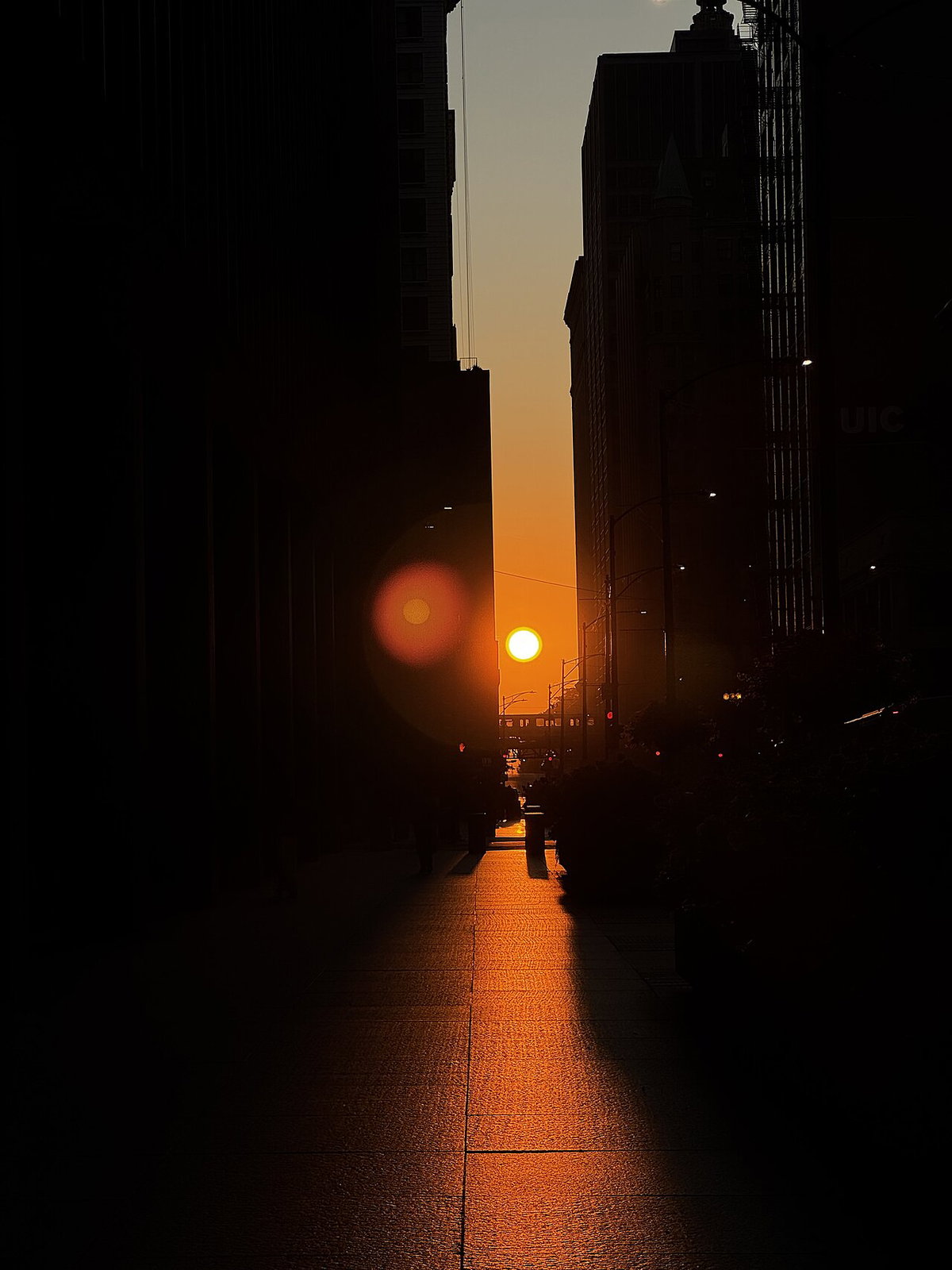 near-equinoctial sunrise in Chicago, Illinois viewed along Jackson Boulevard, Chicago, United States, 2024