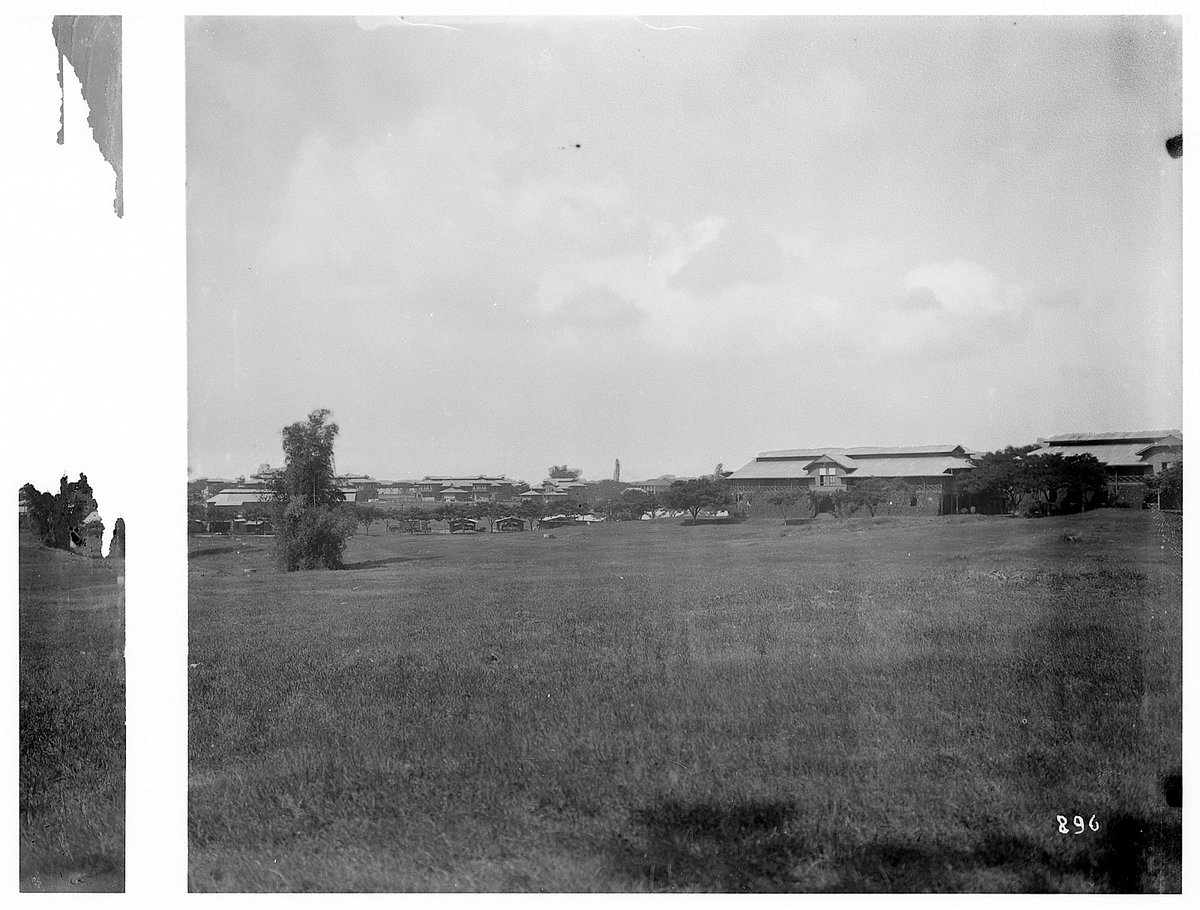 EU: Manila. View over a meadow of houses and barracks (1913), Manila, Philippines, 1913