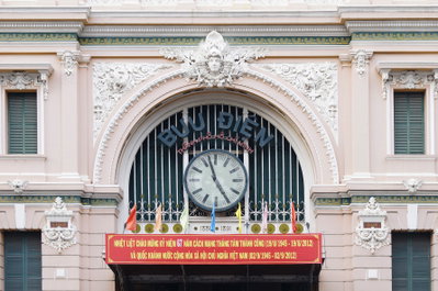Clock and exterior of Saigon Central Post Office, Ho Chi Minh City, 2012