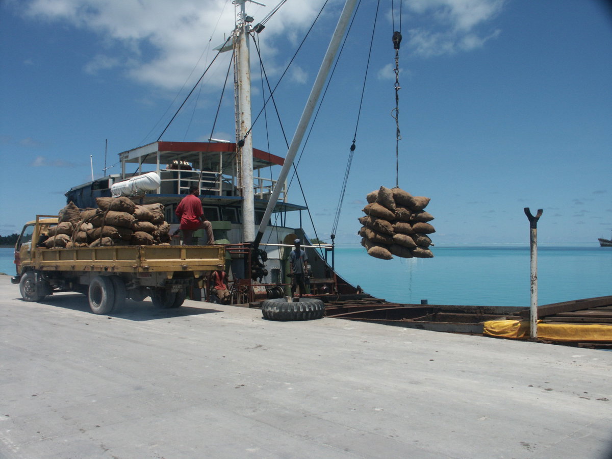 Loading copra at Betio port, Kiribati, Betio, Kiribati, 2005