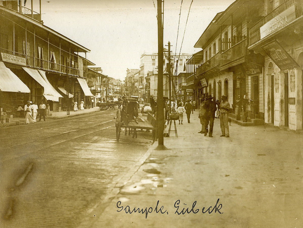 EU: Panama-Stadt. Straßenszene einer Geschäftsstraße mit Einheimischen und Pferdefuhrwerken (1915), Panama City, Panama, 1915