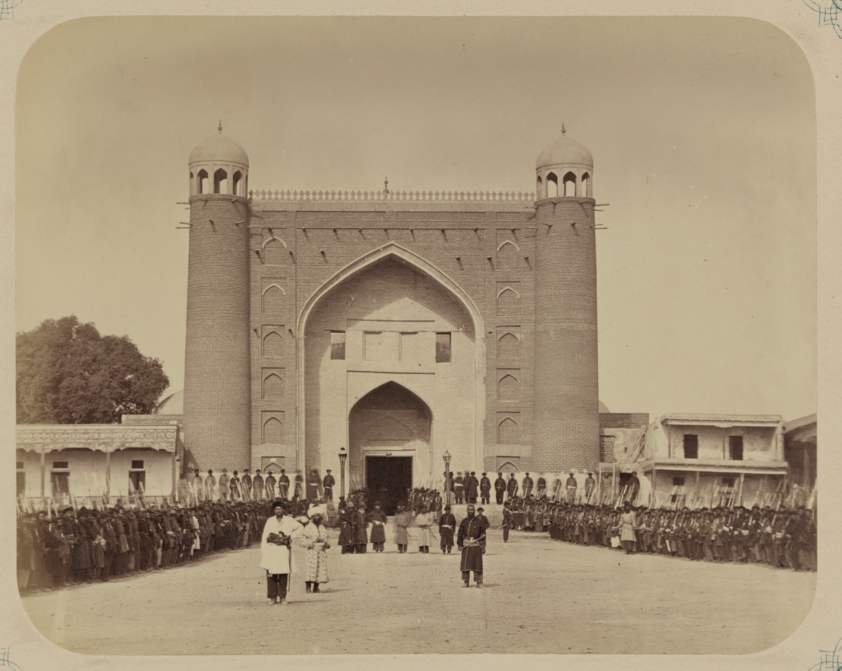 Kokand Khanate. Gate of the Kokand Palace in the City of Kokand. Exterior View, with Soldiers of the Kokand Khan's Army Standing Outside the Entrance, Kokand, Uzbekistan, 1868