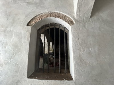 Window at the male dungeon, Elmina, 2025