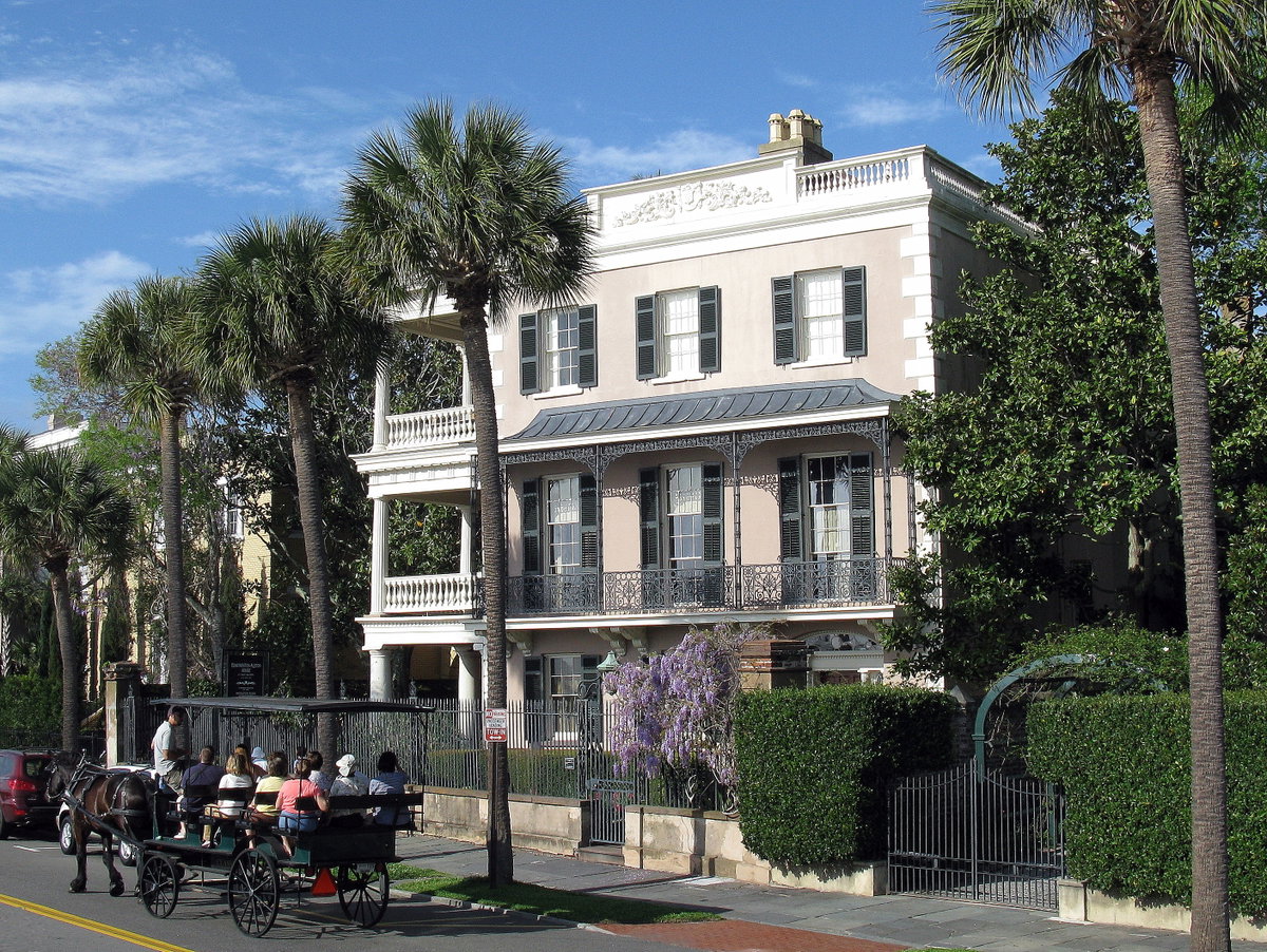 The Edmondston-Alston House, 21 East Battery, Charleston, SC - Visitors on a carriage tour get an earful from their guide, Charleston, South Carolina, USA, 2012