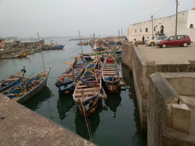 Canoes lying at dock @ Elmina castle, Elmina, 2015