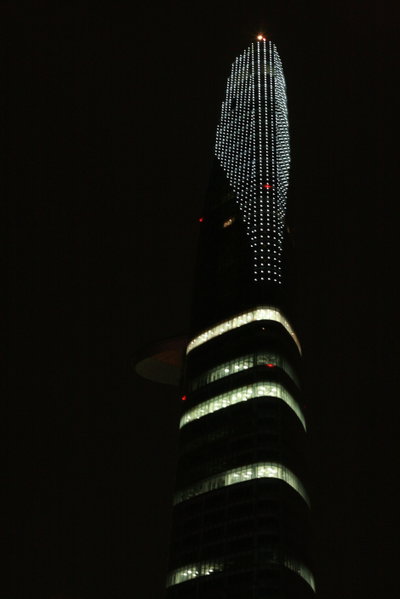Bitexco financial tower by night, Ho Chi Minh City — photos through time