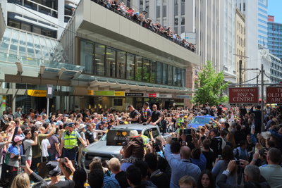 Crowds along Lambton Quay watching the 2015 RWC All Blacks victory parade (Codie Taylor, Julian Savea, TJ Perenara), Wellington, 2015