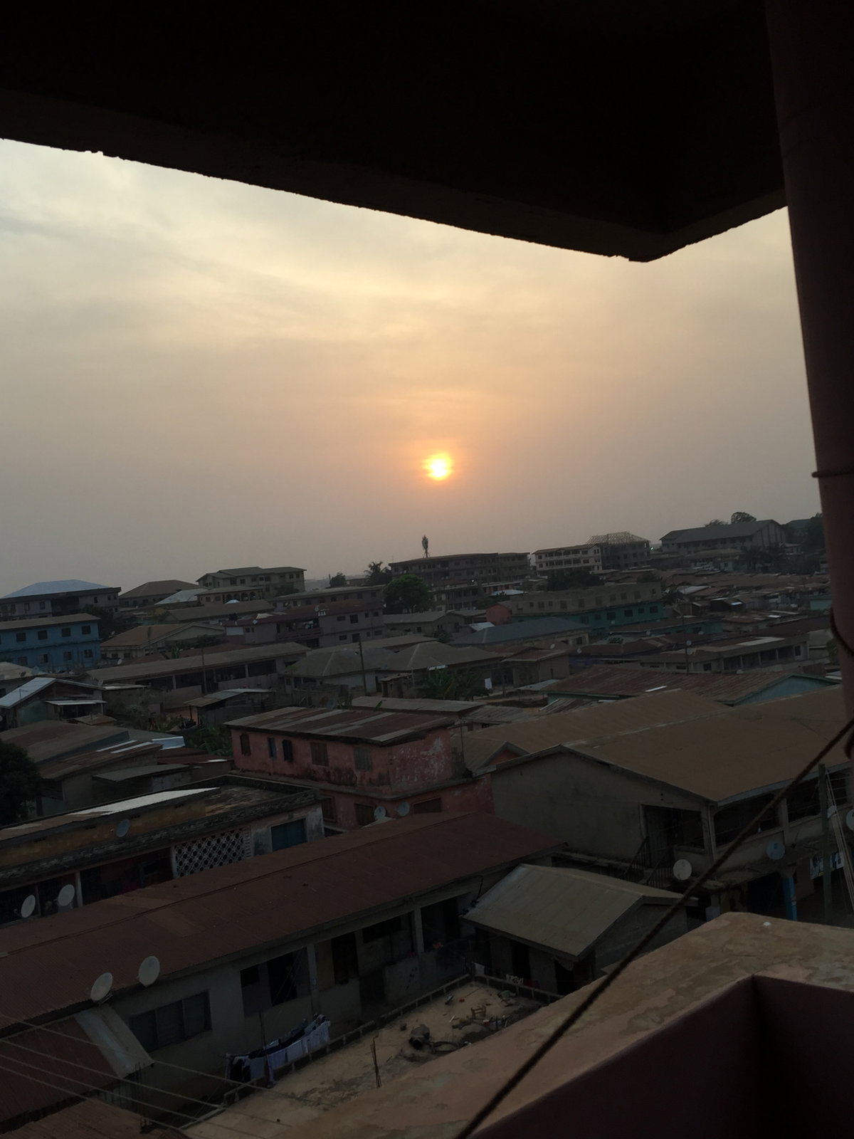 Sunset with its beautiful reddish sun in Atonsu,Kumasi, Kumasi, Ghana, 2021