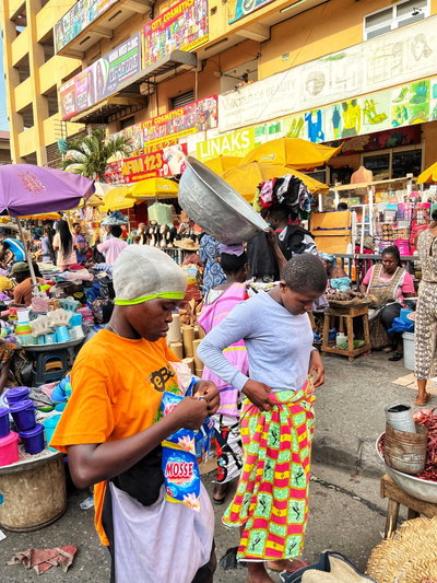 A group of Ghanaian hawkers ending their shift for the day, Accra, 2023