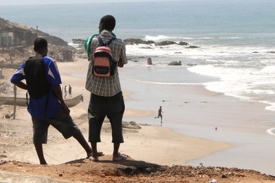 Young Men Look Out on Beach - Cape Coast - Ghana, Cape Coast, 2010