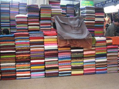 Lascar Traditional street market and Dong Xuan Market by night, Hanoi — photos through time