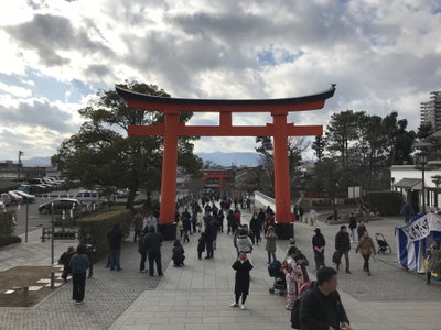 Sando and torii in front of Romon gate of Fushimi Inari Grand Shrine, Kyoto, 2019