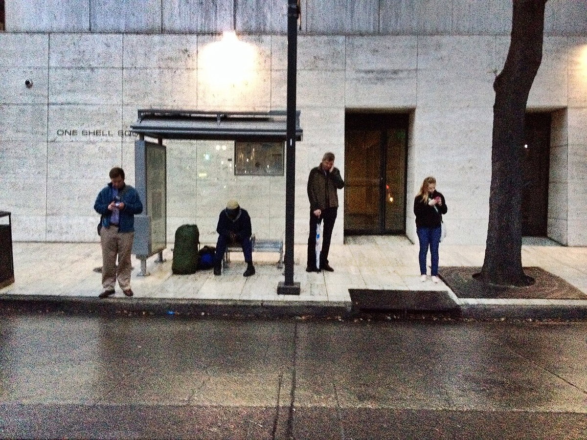Poses at One Shell Square Bus Stop, New Orleans, United States, 2014