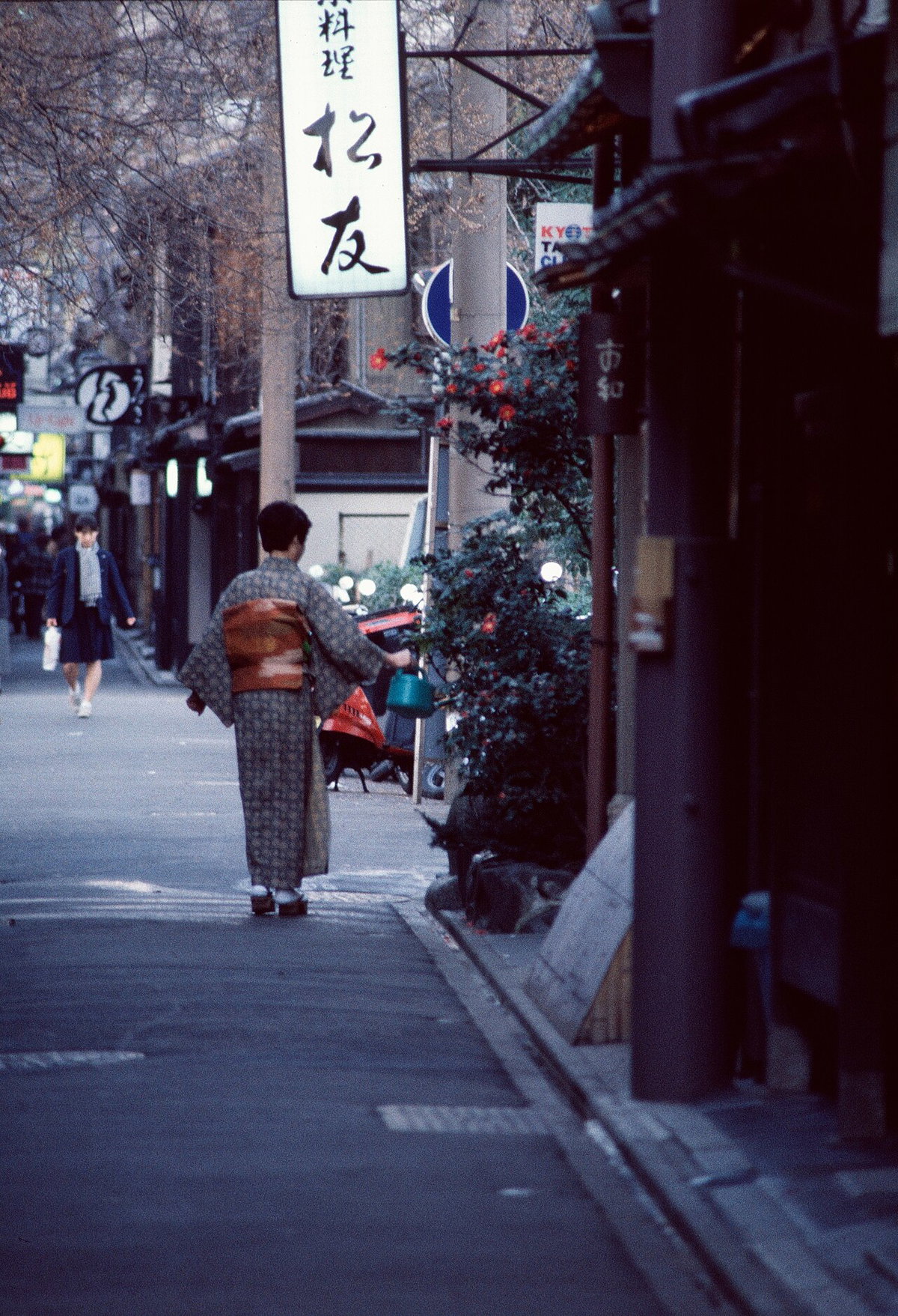 Japan, street view with classic dressed woman, Kyoto, Japan, 1985