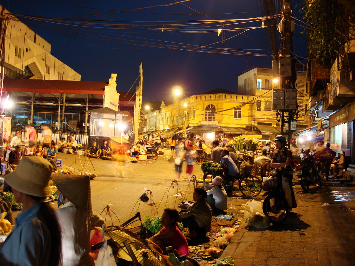 Lascar Traditional street market and Dong Xuan Market by night, Hanoi, Vietnam, 2008